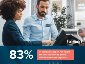 woman showing something on the screen to her colleague