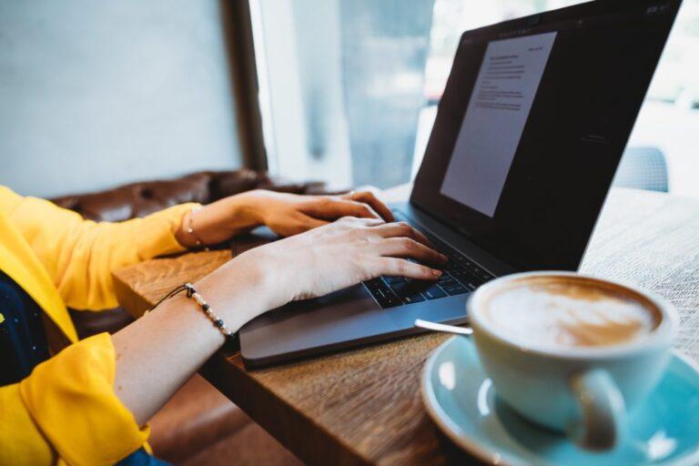 a woman working on her laptop