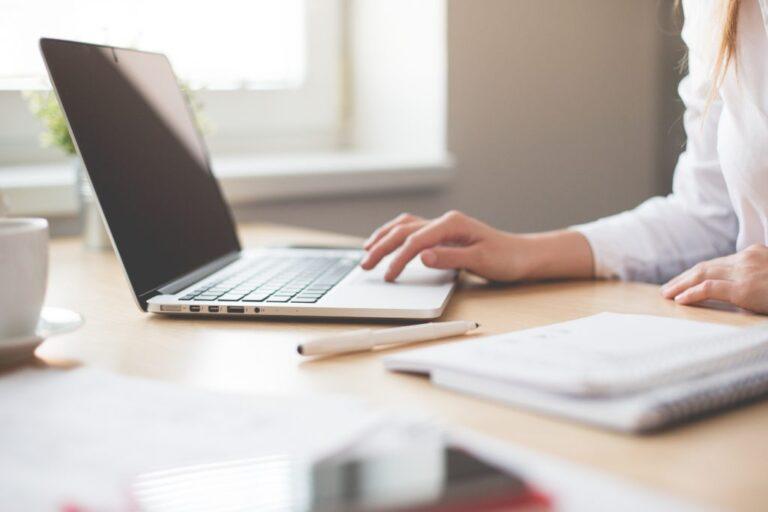 a woman working on her laptop