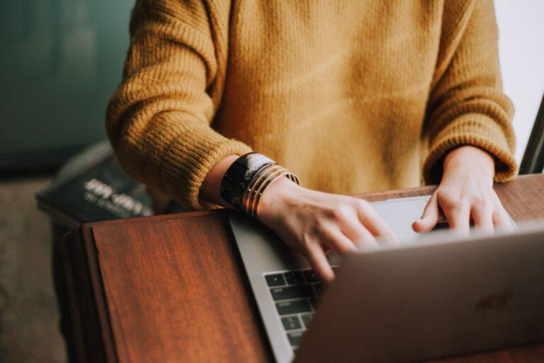 a woman working on laptop