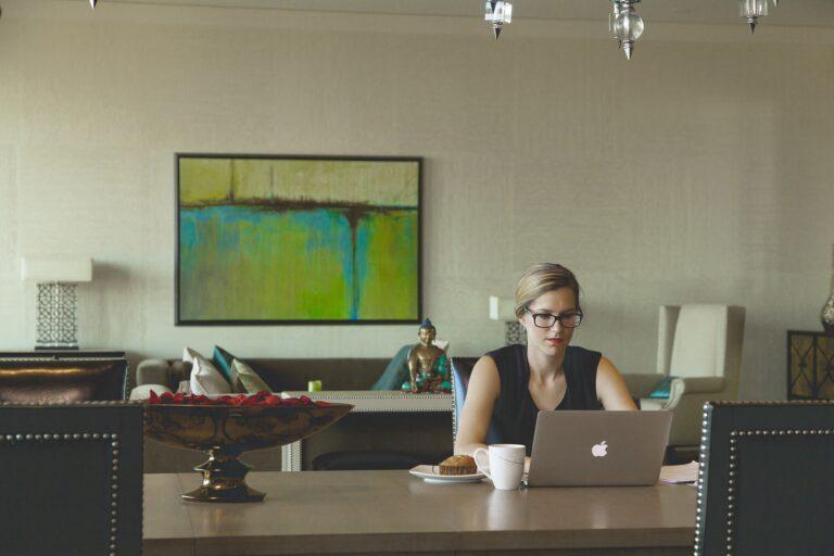 woman working on her macbook