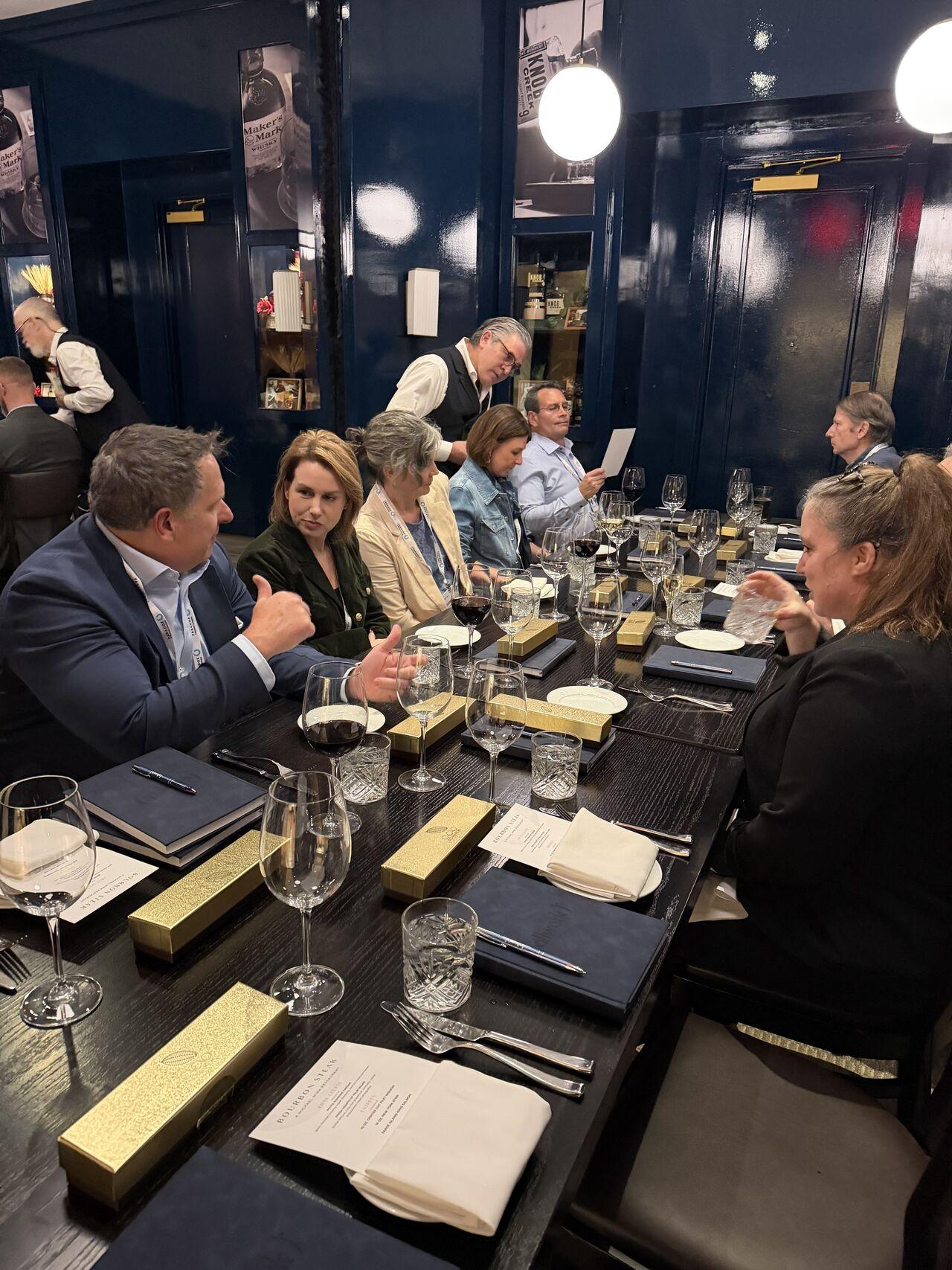 Guests seated at AllWork's Gartner HR Symposium networking dinner